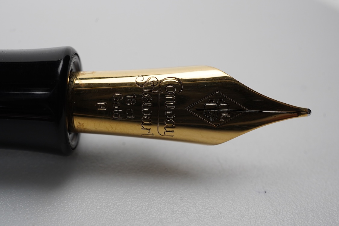 A modern Conway Stewart 'Duro' in stunning purple fitted with 18ct. gold medium nib